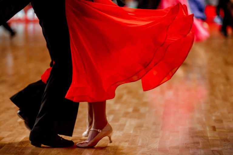Red ball gown dancing